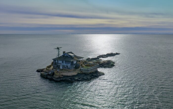 Island,Home.,Solitary,Island,House.,Getaway,House,On,Rocky,Island.