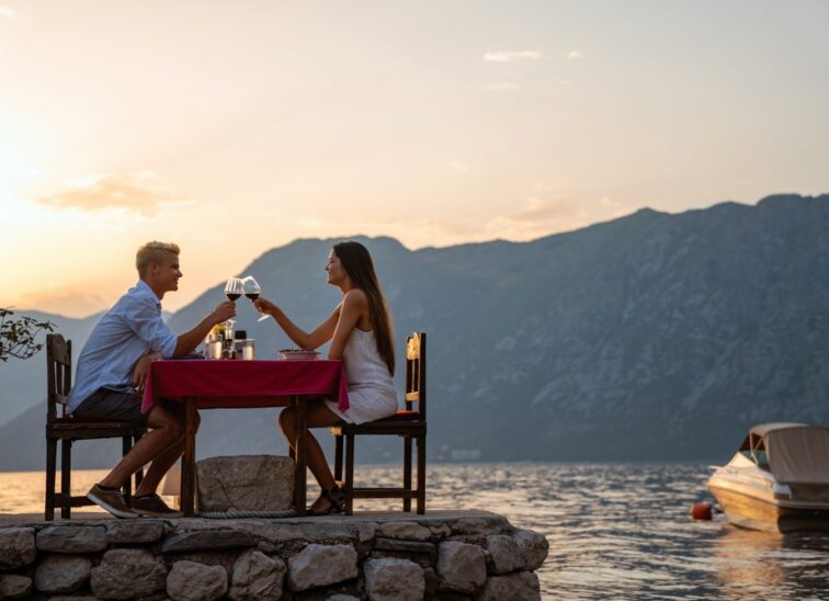 Couple,In,Love,Drinking,Wine,On,Romantic,Dinner,At,Sunset